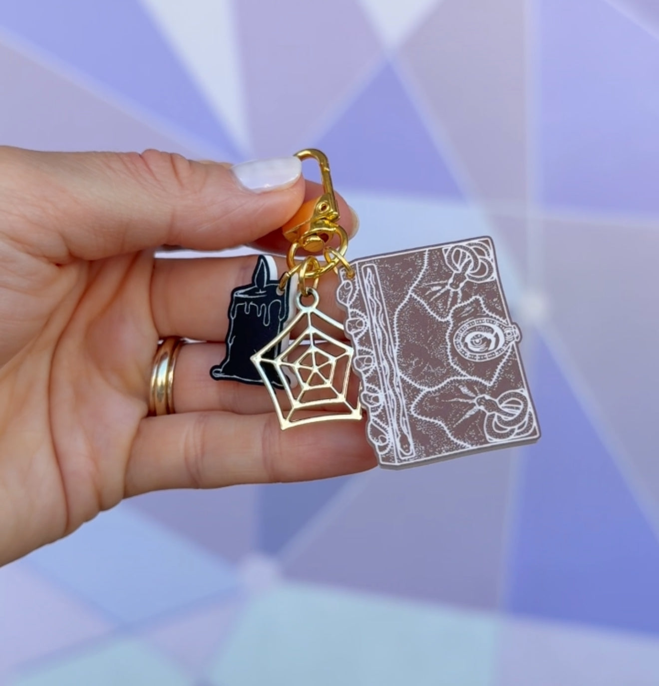 BOOK OF SPELLS MINI BAG CHARMS/ KEYCHAINS SET